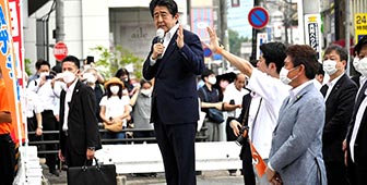 Abe seconds before his assassination. (Photo: NPR)